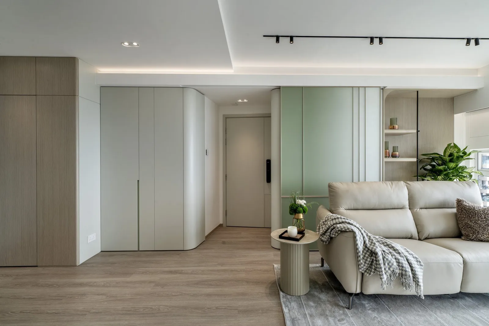 A custom entrance foyer with built-in shoe storage in a Hong Kong flat